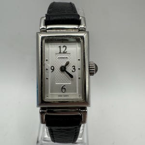 Montre débardeur argentée vintage fabriquée en Suisse avec bracelet en cuir noir pour femme, cadeau pour femme petite créatrice de mode minimaliste