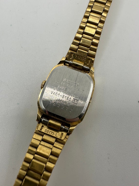 【送料無料】 V401 Seiko Ladies Vintage Gold Face Black Watch Tank Tone 時計