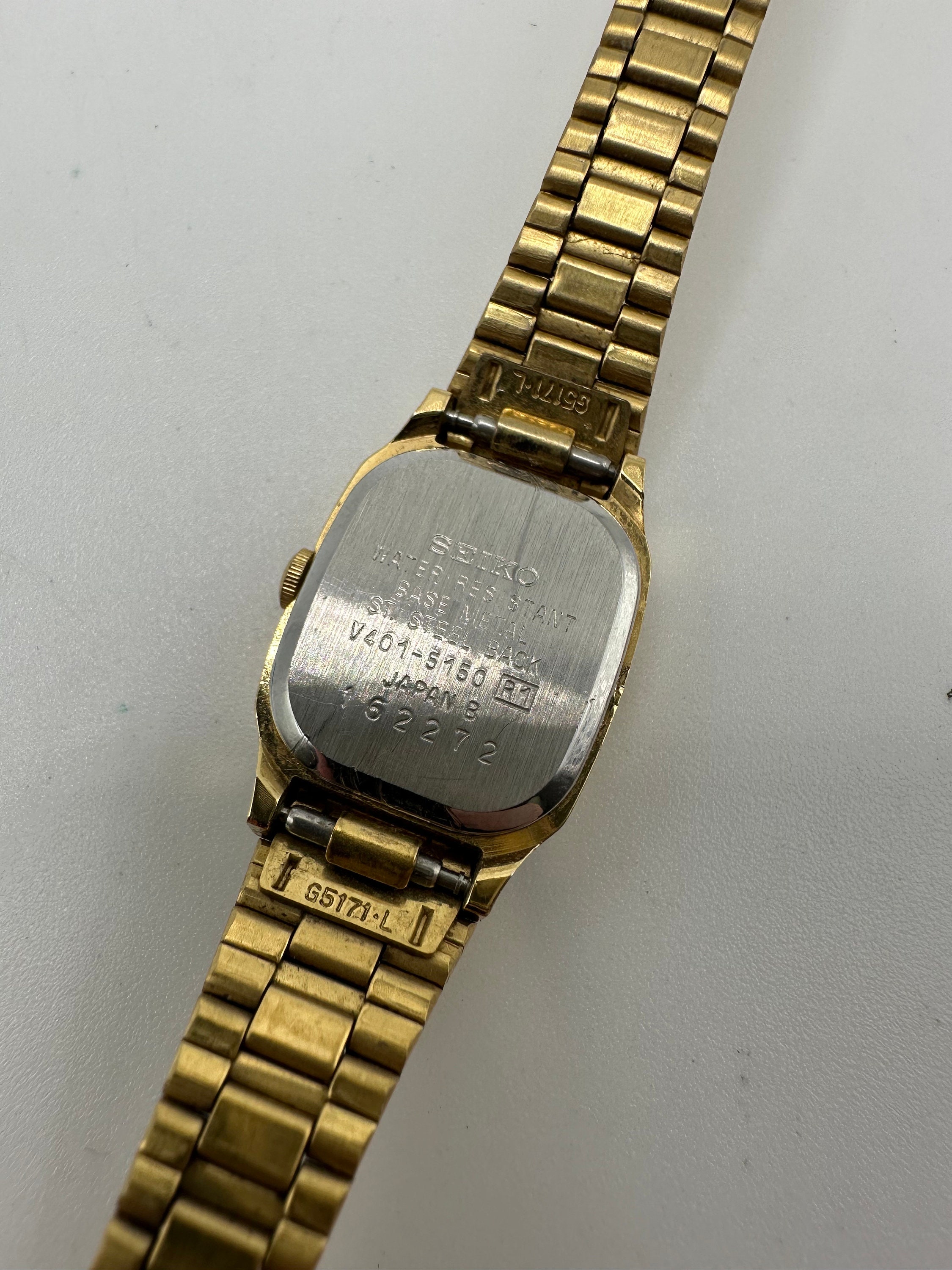 セイコー　21jewelrys Vintage Ladies Seiko V401 Gold Tone Tank Watch Black Face