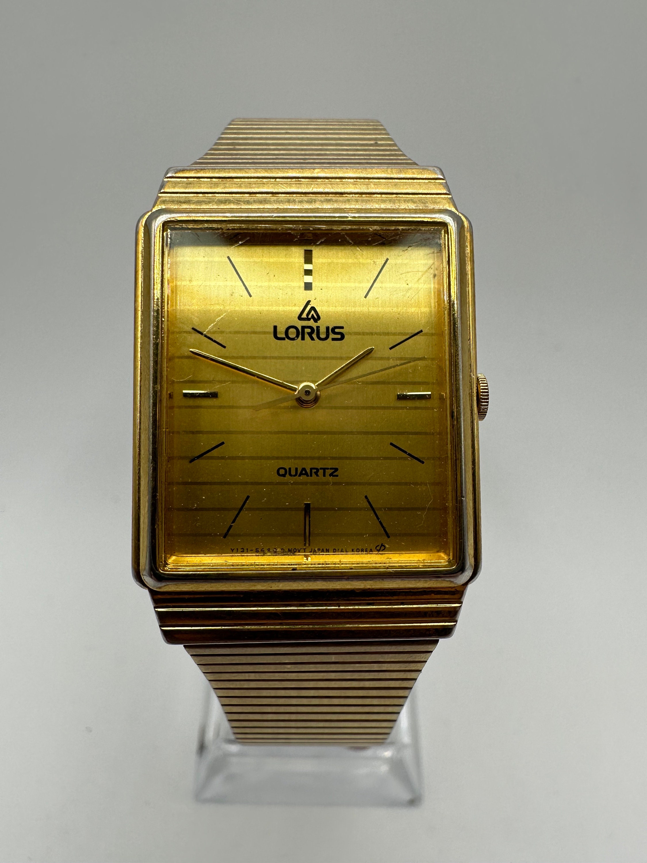Vintage Lorus Y131 by Seiko Gold Tone 26mm Tank Rectangle Vintage Lorus Y131 by Seiko Gold Tone 26mm Tank Rectangle