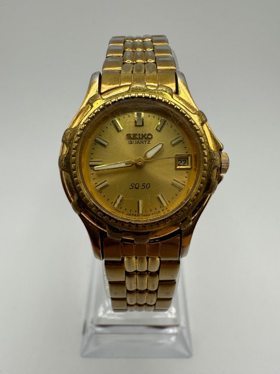 vintage Seiko SQ50 ladies date diver Watch gold to