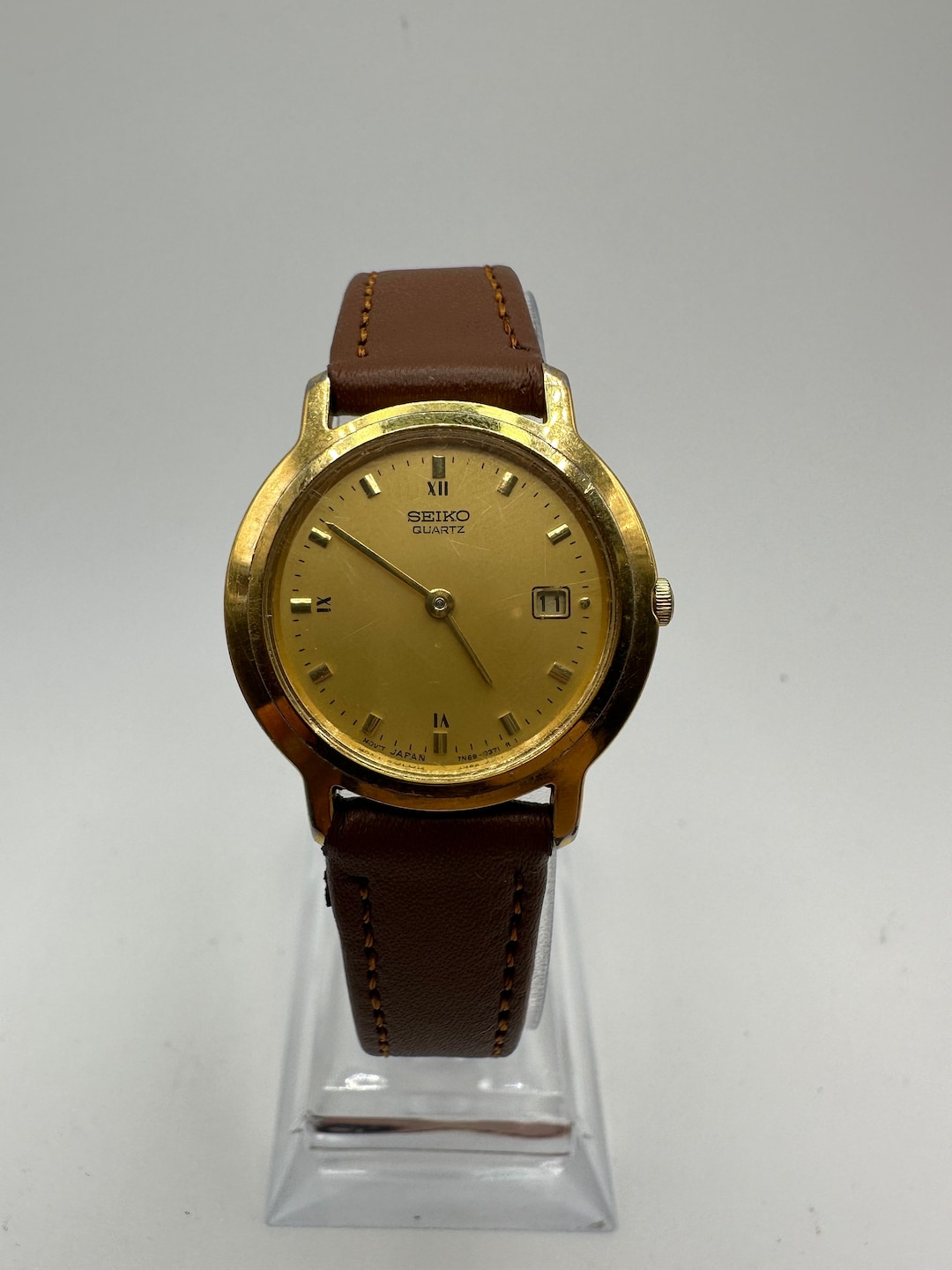 Vintage Seiko 7N89 Ladies Circle Gold Tone Dress Watch Faux Brown