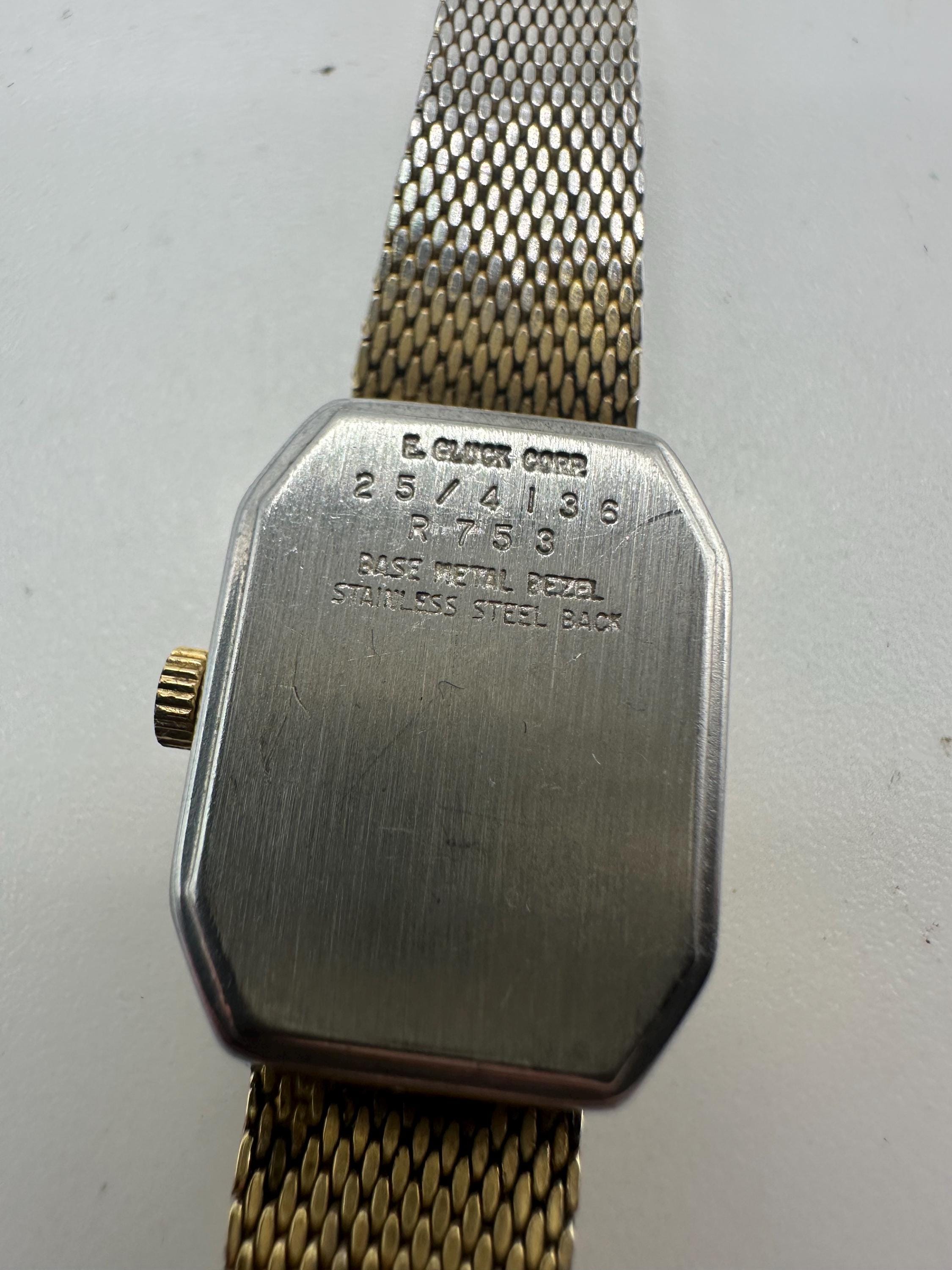 Vintage Armitron Ladies Gold Tone Tank Watch Adjustable 