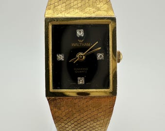 Vintage Waltham Ladies Black Face Gold Tone Tank Watch Dress  display picture 2