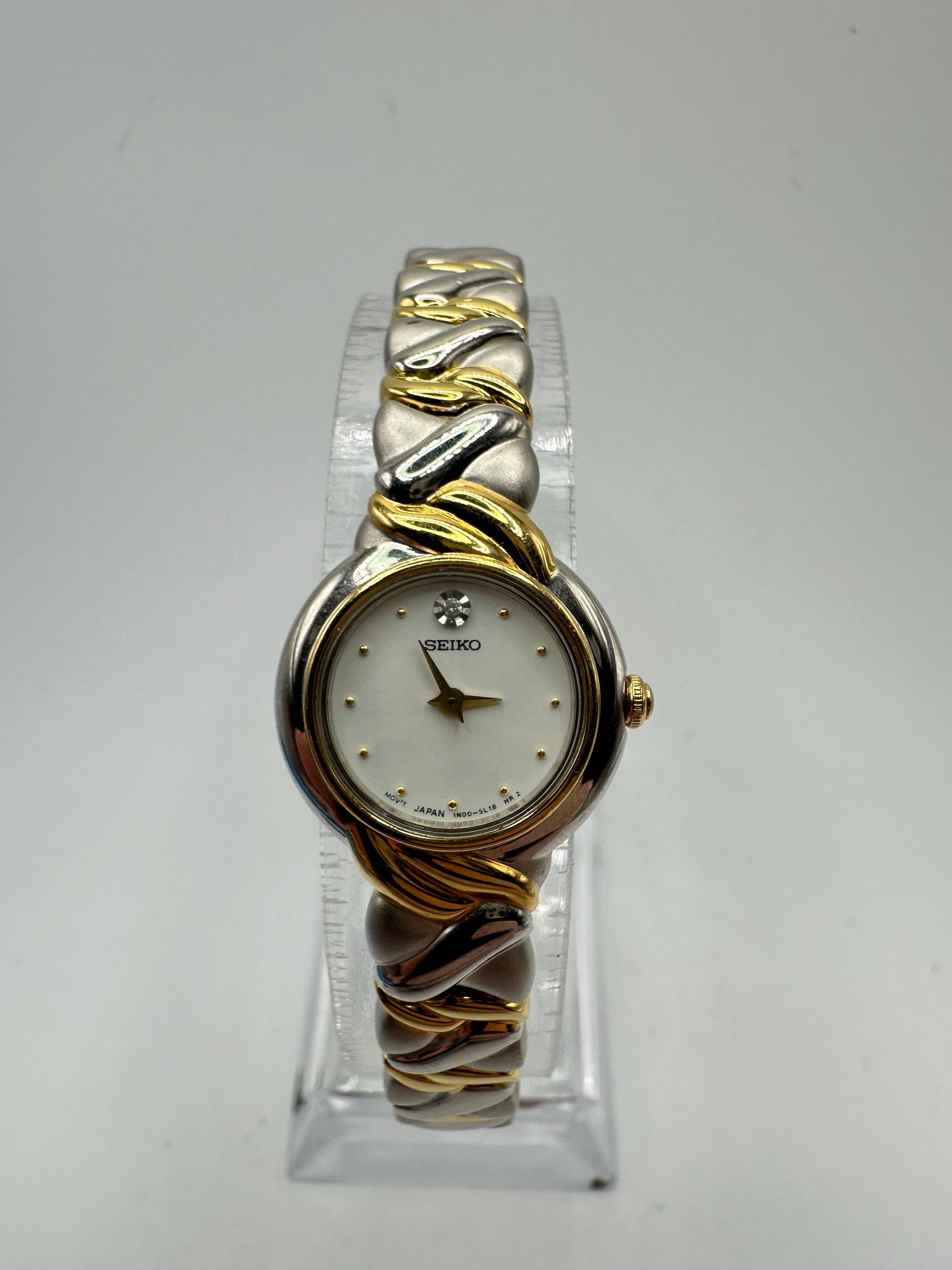 Vintage Seiko 1N00 Ladies Gold Silver Tone Circle Dress Watch