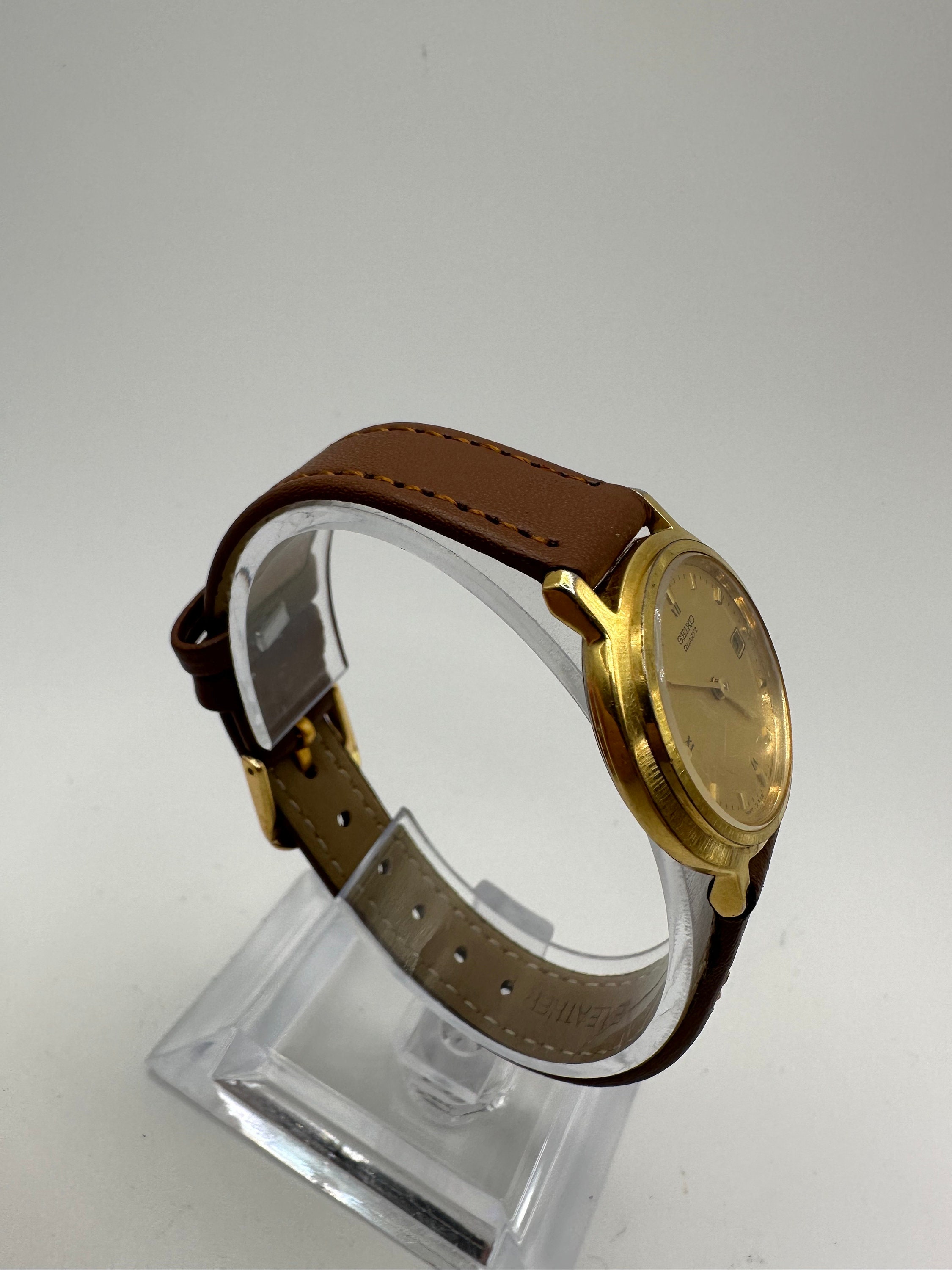 Vintage Seiko 7N89 Ladies Circle Gold Tone Dress Watch Faux Brown 