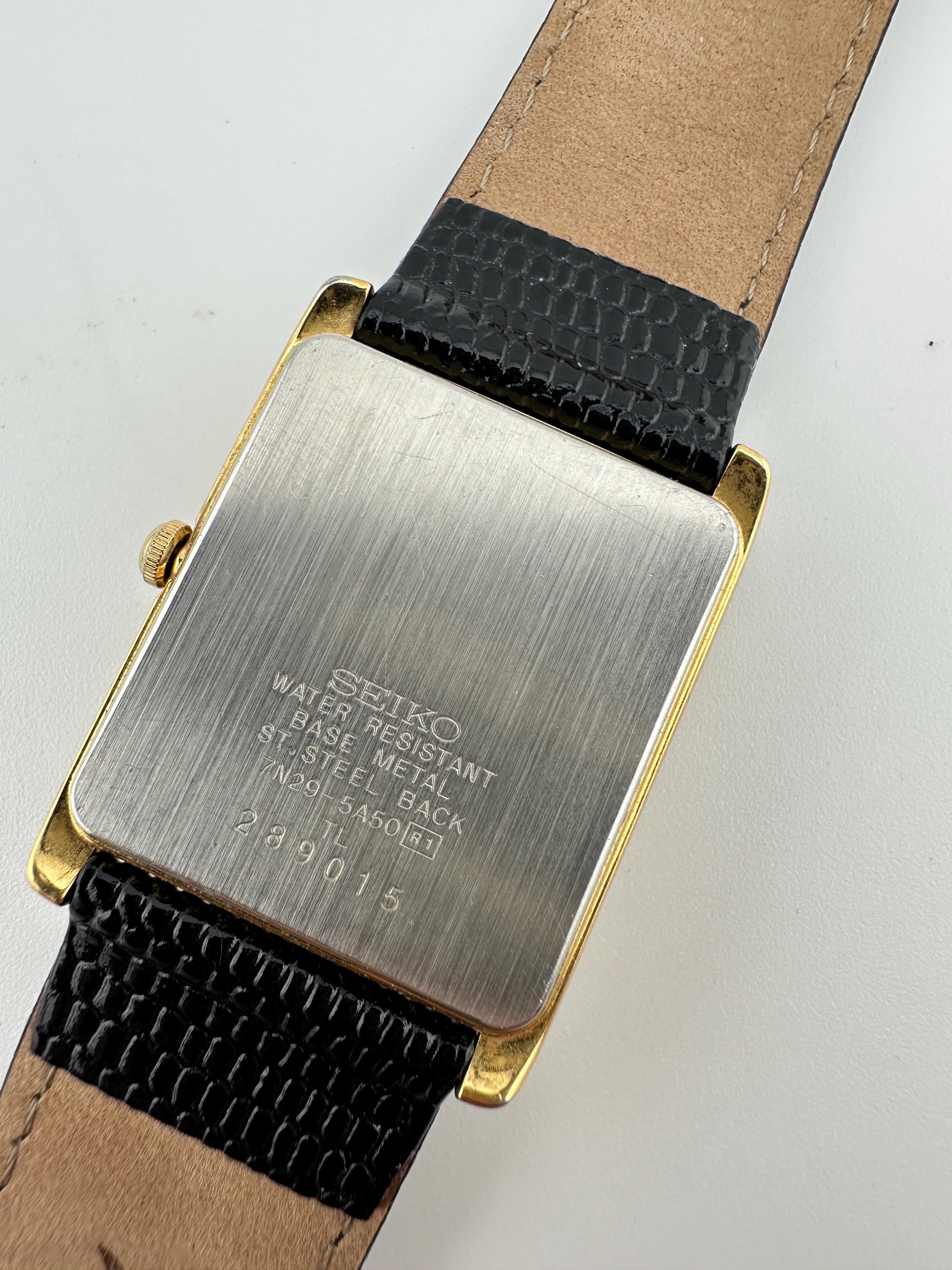 Seiko 7N29 Vintage Gold Tone Tank Watch Black Leather Strap