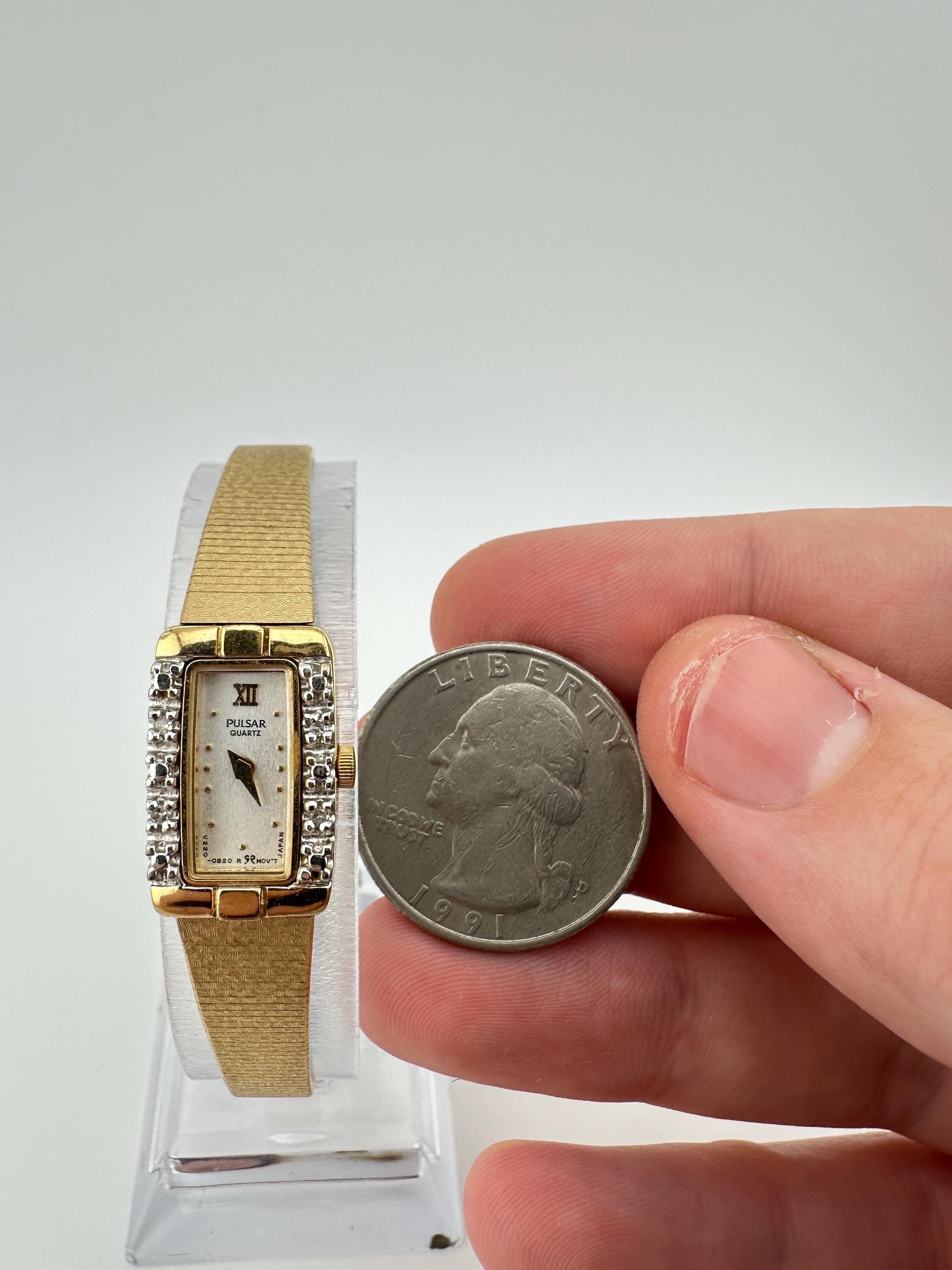 Vintage Pulsar by Seiko V220 Ladies Gold Tone Tank Watch 