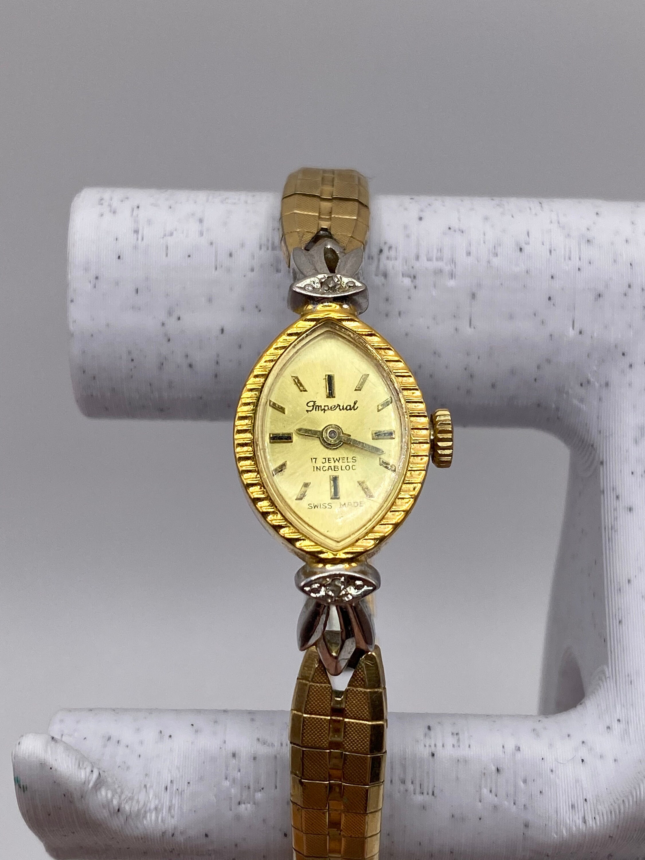 Imperial gold watch hotsell