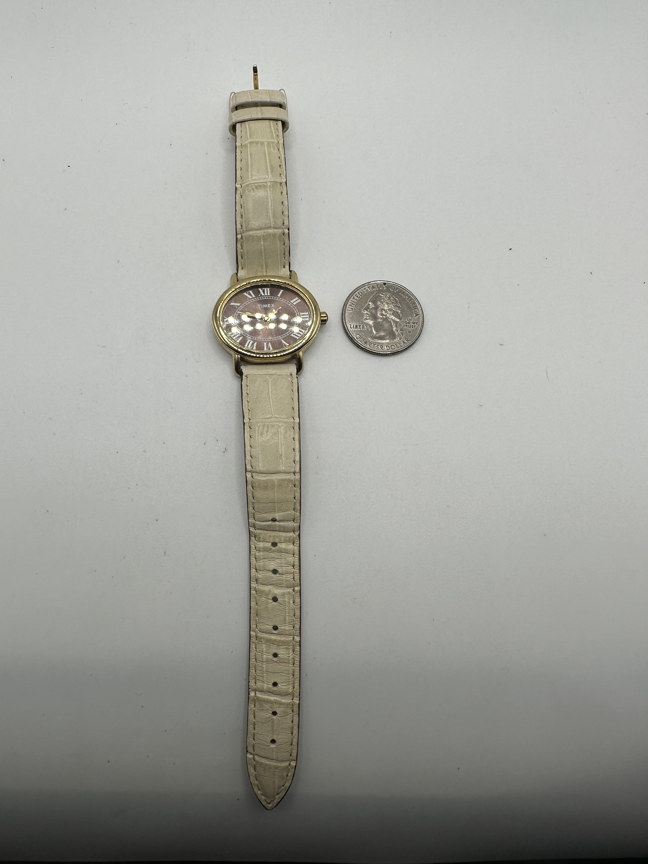 Vintage Timex Ladies Gold Tone Oval Watch White Leather  display picture 3