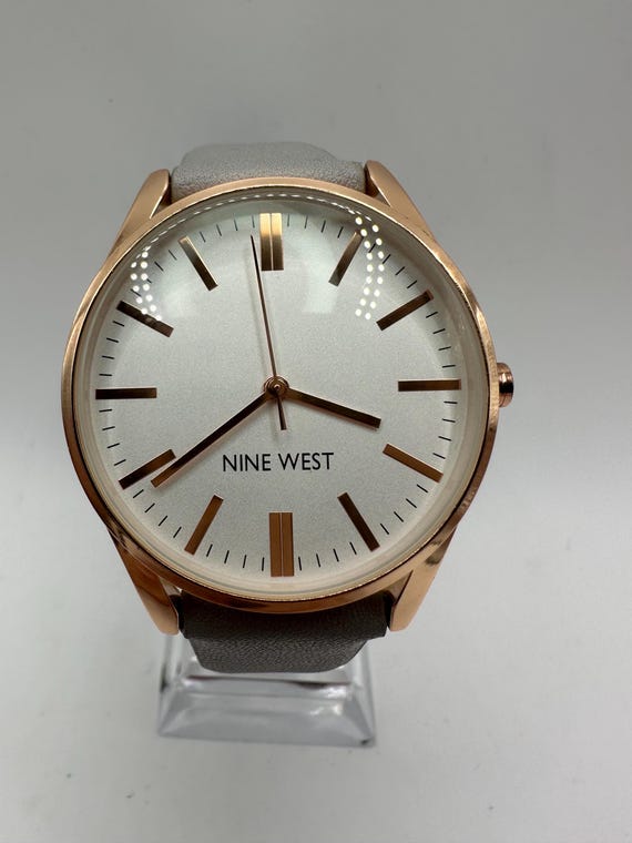 Montre de marque Nine West pour dames en or rose avec bracelet en