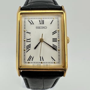 Seiko Rare V701 Vintage Tank Watch Gold Tone Roman Numerals White