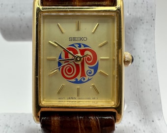 Montre débardeur vintage Seiko RARE 1N01 pour femme Boston pizza bracelet en cuir doré cadeau à sa maman carrée petite mode délicate