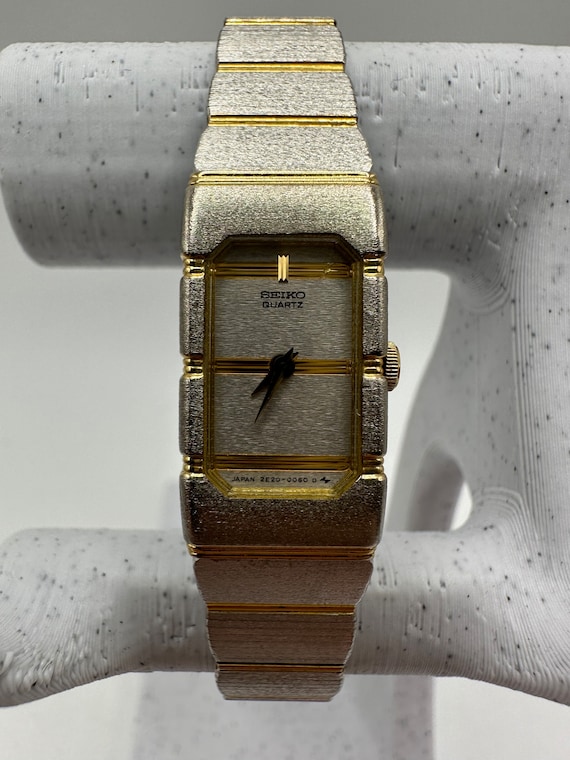 vintage Seiko 2E20 tank Watch silver and gold rect