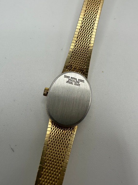Nicolet diamond quartz watch hotsell