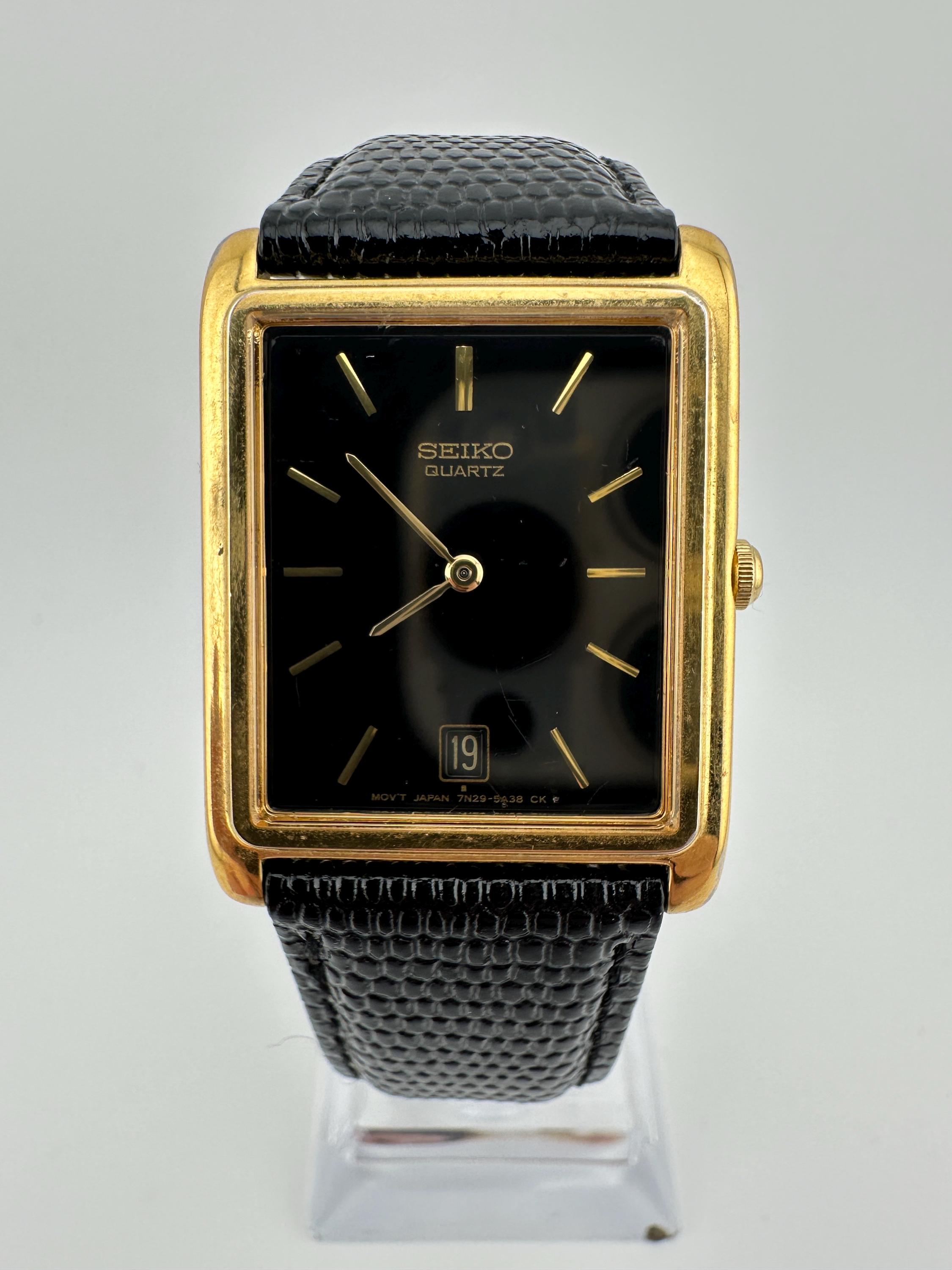 Seiko 7N29 Vintage Gold Tone Tank Watch Black Leather Strap