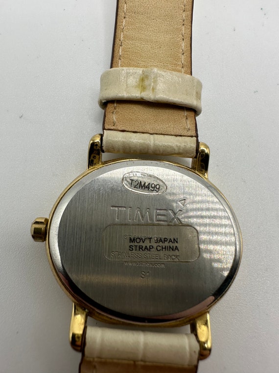 Vintage Timex Ladies Gold Tone Oval Watch White Leather  display picture 3