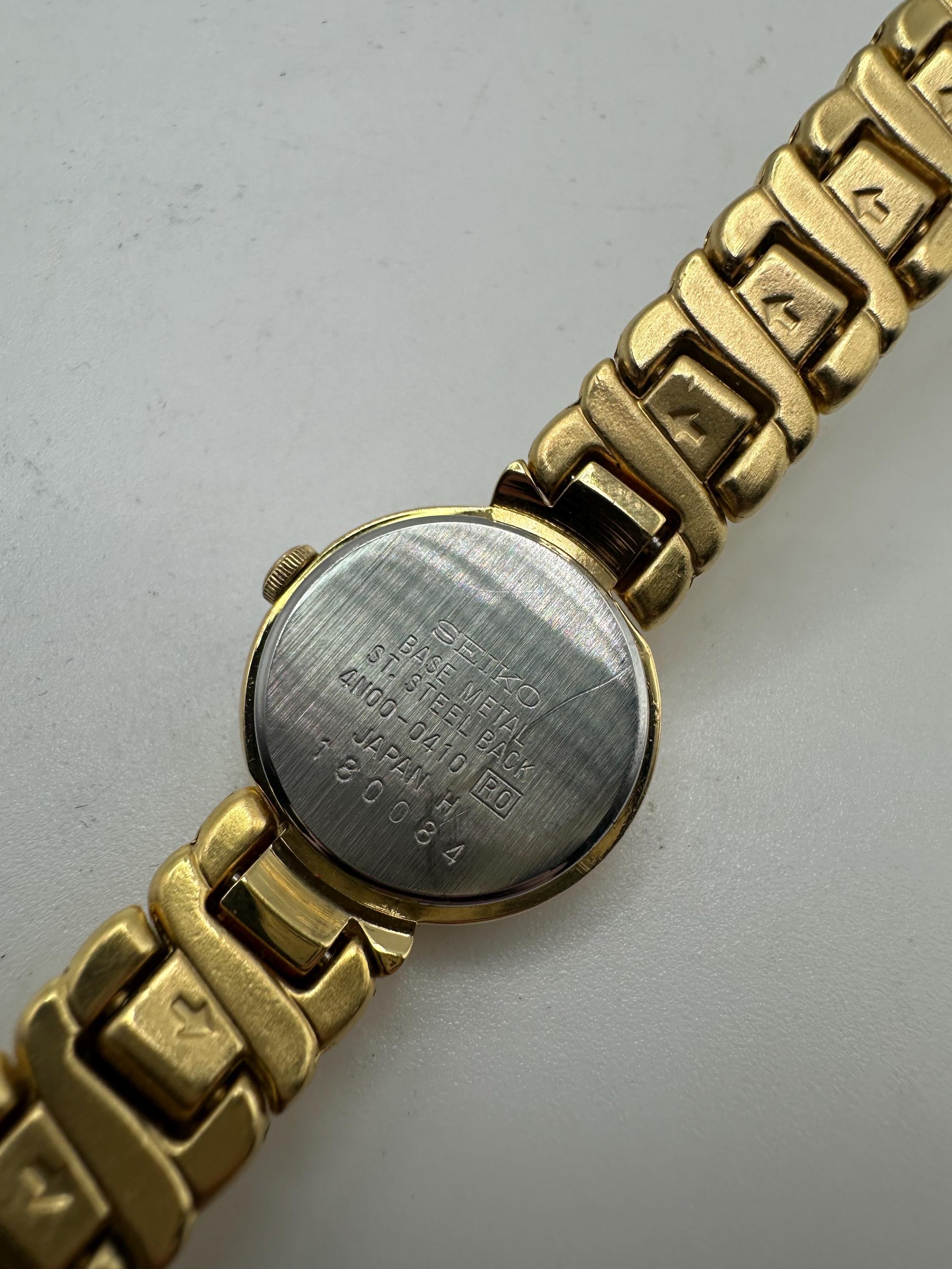 Vintage RARE Seiko 4N00 Gold Tone Ladies Circle Dress Watch 