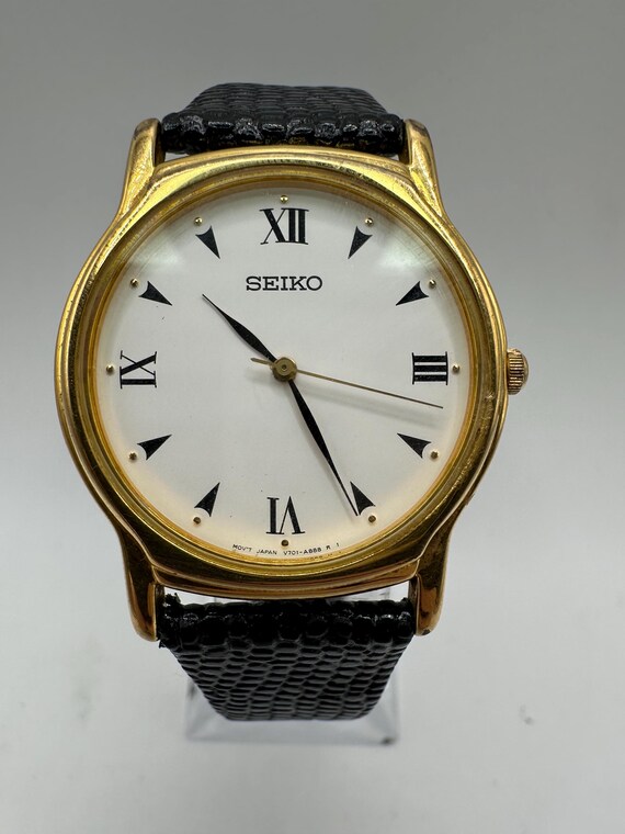 Seiko Vintage V701 Damen Armbanduhr Gold Ton Kreis weißes Zifferblatt  römische Ziffern Lederarmband Geschenk ihre Frauen Mutter Verkauf Kleid dünn