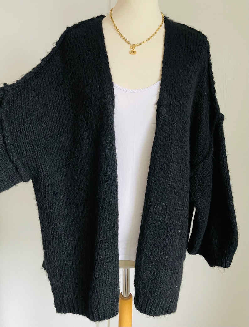 Flauschiger oversized Cardigan Schwarz SCHUHZWANG Bild 1