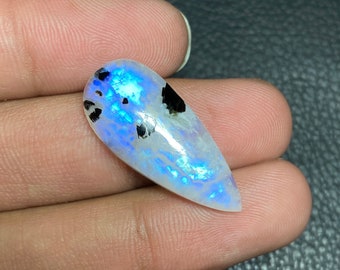 Mind Blowing ~ Blue Fire Rainbow Moonstone Pear Shape Cabochon Gemstone Size - 12.50x29x6.50 Mm. With Black Tourmaline For Making Jewelry.!!