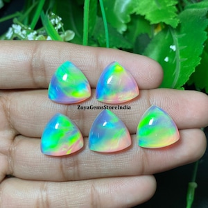 Aurora Opal Doublet Cabochon Size - 10 To 25 Mm. AAA+++ Quality Aurora Doublet Trillion Shape Gemstone For Making Jewelry.