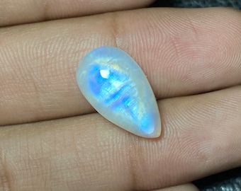 WOW ~~ Blue Flashy Rainbow Moonstone Size - 11x19x7.50 Mm. 12.85 Carat. Flat Back Pear Shape Cabochon Loose Gemstone.