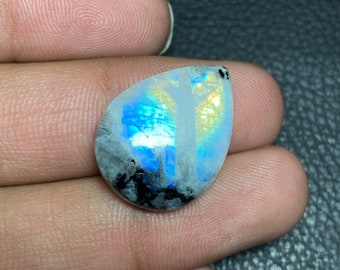 Wonderful !! Rainbow Moonstone Flat Back Pear Shape With Black Tourmaline Cabochon Size - 17.50x23.50x6 Mm. Beautiful Blue Flashy Gemstone.