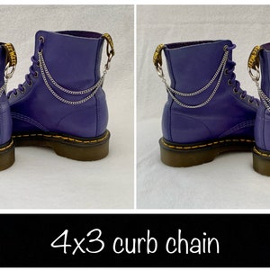May include: Purple leather boots with three silver curb chains attached to the back of each boot. The text "4x3 curb chain" is written below the image.