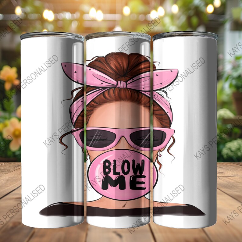 A 20oz Skinny Tumbler with an image of a cute messy bun lady head. there is a pink bandana wrapped around her hair and she has pink sunglasses with black lenses on. She is blowing a big pink bubble with the words "BLOW ME" written in black bubble lettering.