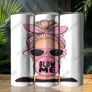 A 20oz Skinny Tumbler with an image of a cute messy bun lady head. there is a pink bandana wrapped around her hair and she has pink sunglasses with black lenses on. She is blowing a big pink bubble with the words "BLOW ME" written in black bubble lettering.