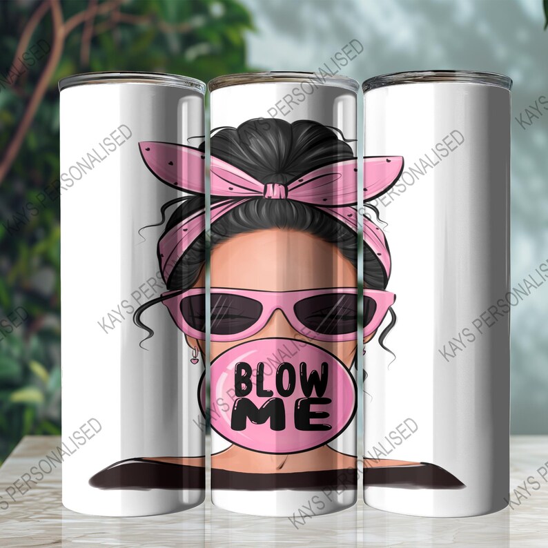 A 20oz Skinny Tumbler with an image of a cute messy bun lady head. there is a pink bandana wrapped around her hair and she has pink sunglasses with black lenses on. She is blowing a big pink bubble with the words "BLOW ME" written in black bubble lettering.
