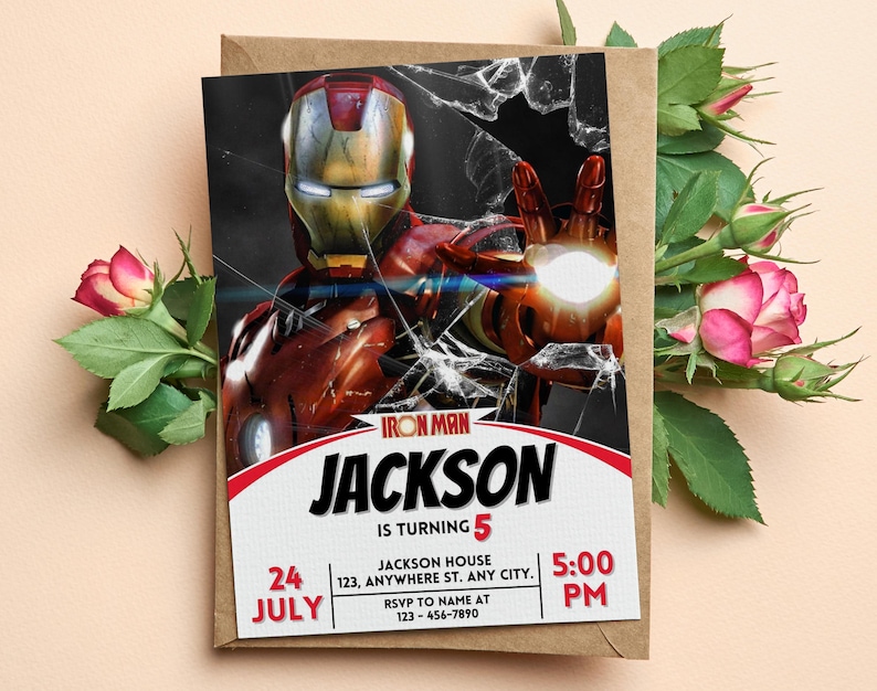 May include: A birthday invitation with an Iron Man theme, showing a red and gold Iron Man illustration against a broken glass effect. The invitation includes the name "Jackson", age "5", date, time, and RSVP details. The invitation is on a brown envelope.