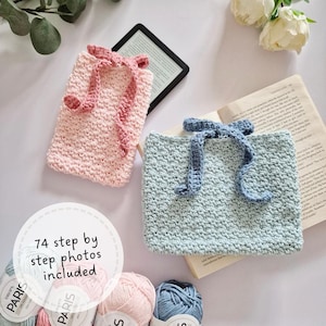 May include: A light pink crocheted sleeve with a matching tie and a light blue crocheted sleeve with a matching tie. The image includes text that reads 74 step by step photos included, along with four skeins of yarn labeled DROPS PARIS.