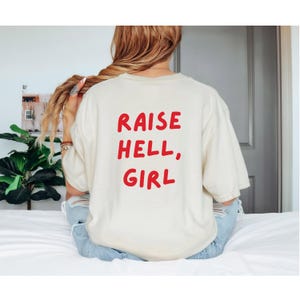 Raise Hell Girl Tee, feminist trendy girl power women’s rights activist shirt, comfort colors vintage inspired graphic tee