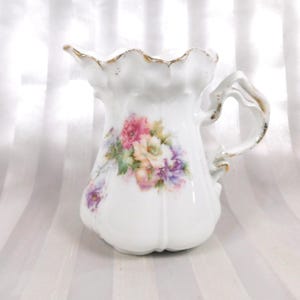 White Unmarked Creamer with Floral Design and Split Handle # 26121