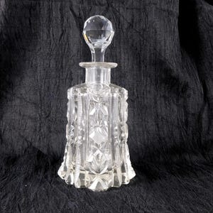 May include: A set of three ceramic nesting bowls in shades of blue, green, and white. The bowls feature a speckled glaze and a simple, modern design. The largest bowl is approximately 6 inches in diameter.