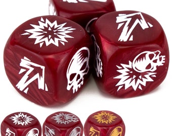 May include: Three red dice with white symbols. The symbols include a skull, an arrow, and an explosion. The dice are made of a shiny material.