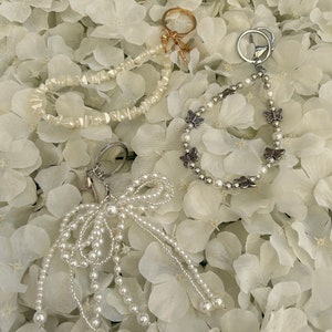 Faux pearl butterfly /  bead chip or bow bag charms/ keyrings