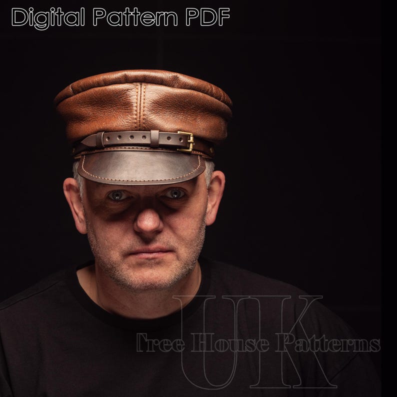 May include: A brown leather cap with a strap and buckle. The cap has a slightly rounded crown and a flat brim. The cap is worn by a person with a black shirt. The text "Tree House Patterns" is visible in the bottom right corner of the image.