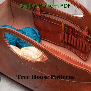 May include: A brown leather tote bag with a zipped pocket and a label that says "Digital Pattern PDF" and "Tree House Patterns". The bag is open and contains yarn and knitting needles.