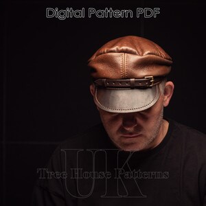 May include: A brown leather cap with a dark brown brim and a strap with a buckle. The cap is worn by a person with a dark shirt. The text "Tree House Patterns" is visible at the bottom of the image.