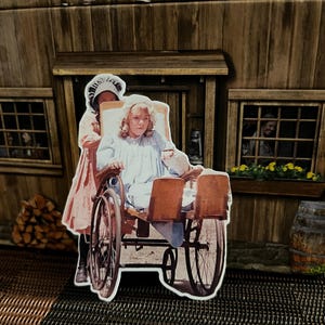 It's Nasty Nellie Oleson and Laura Ingalls is shoving her in the wheelchair! Free Gifts! Free Shipping!