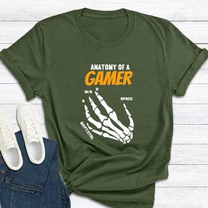 Gaming Keyword Design Tee
Spooky Gamer Shirt
Gaming Themed Shirt
Casual Gaming Apparel