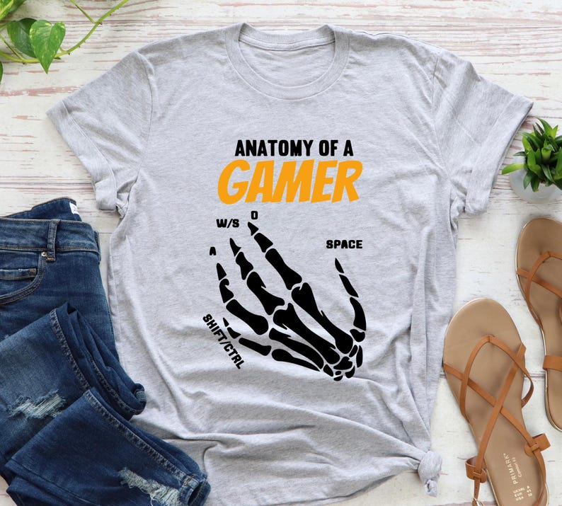 Video Game Lover Shirt
Labeled Skeleton Hands Shirt
Fun Gaming T-Shirt
Gamer Anatomy Shirt
Gaming Apparel
Cool Gamer Graphic Tee
Skeleton Hands Graphic Shirt