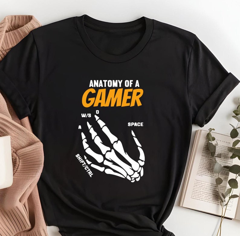 Anatomy of a Gamer Shirt
Skeleton Hands Gaming Tee
Funny Gamer T-Shirt
Gaming Keyword Buttons Shirt
Gamer Graphic Tee
Unique Gamer Design Shirt
Gaming Humor Shirt
Skeleton Hands Design Shirt
Gamer Gift Idea
Gaming Enthusiast Shirt