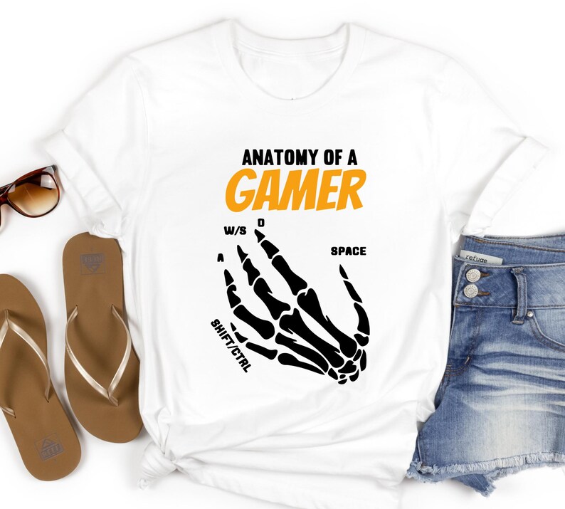 Skeleton Hands Design Shirt
Gamer Gift Idea
Gaming Enthusiast Shirt
Unisex Gamer Tee
High-Quality Gaming Shirt
Creative Gaming Shirt
Casual Gamer Shirt