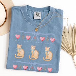 Kokette Katze Shirt für Frauen, süßes Vintages 80er Jahre Kätzchen T-Shirt Pastellschleife blaues Band T-Shirt Girly Cottagecore T-Shirt für Katzenliebhaber und Haustierbesitzer