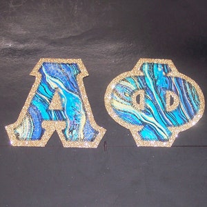 Alpha Phi Shirt -- Blue Swirl on Gold Glitter