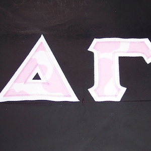 Delta Gamma Shirt -- Pink Cow Print on White Twill